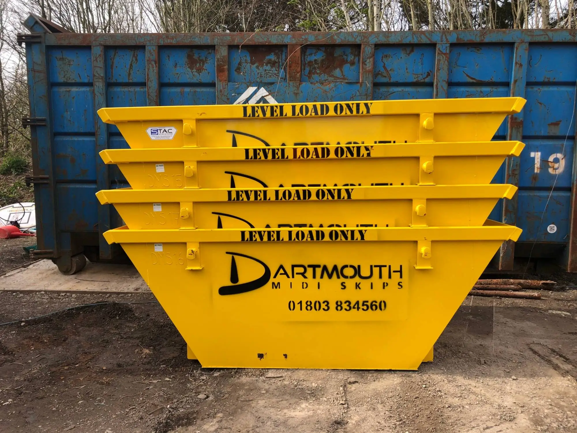 Stack of yellow 4 yard midi skips Dartmouth Midi Skips Dartmouth